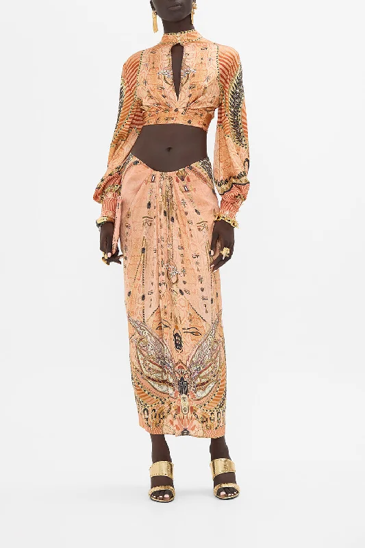 DRAPE FRONT SKIRT WITH SPLIT KINGDOM OF HEIROGLYPHS ruffled skirt detail